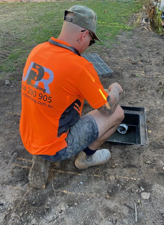 JPR Plumbing tradesperson completing drainage work